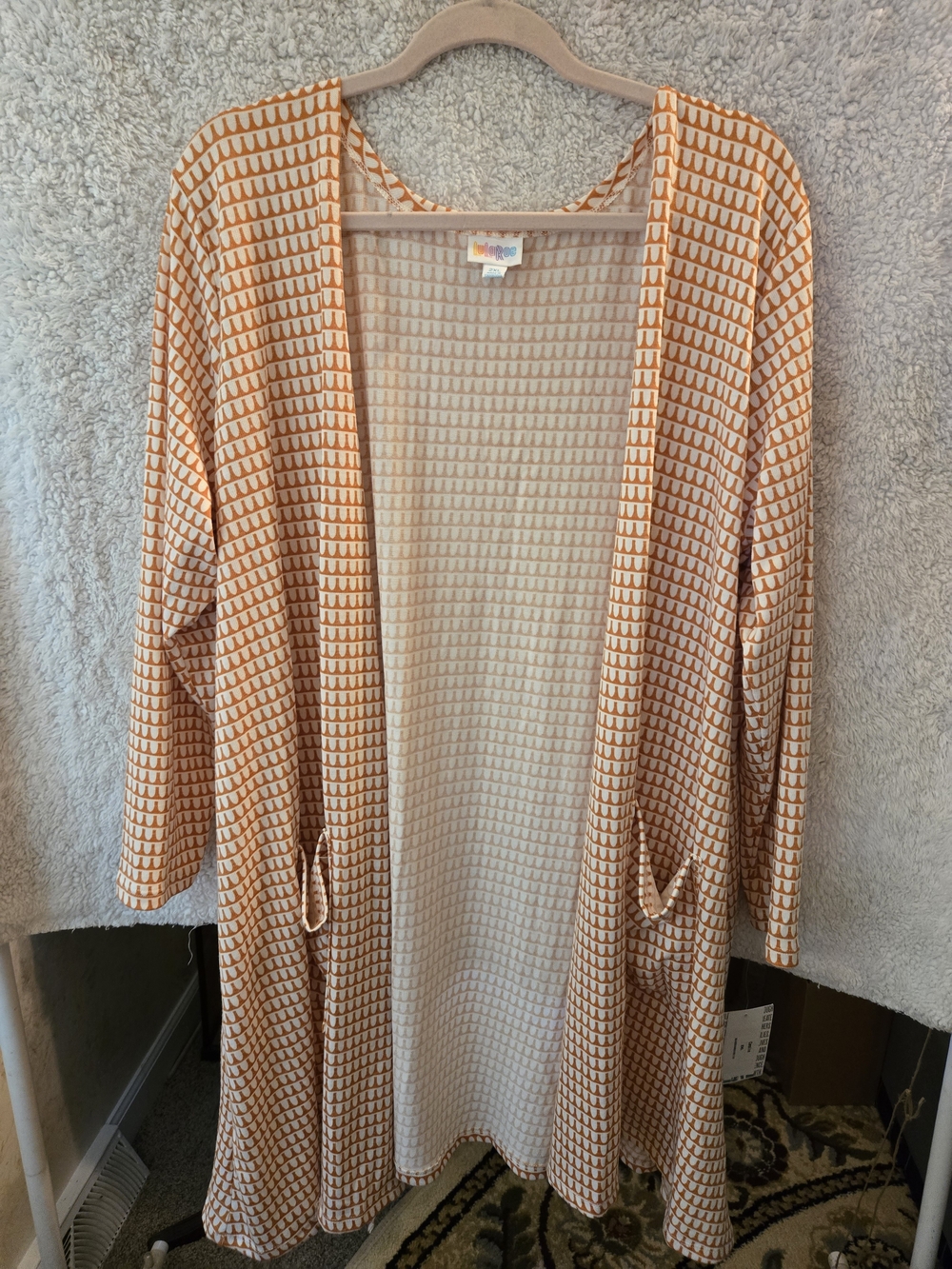 LuLaRoe Beige and Orange Patterned Top